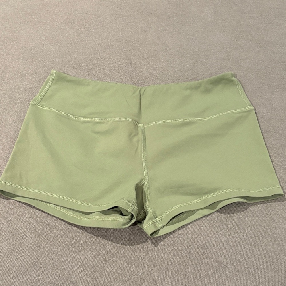 Savage Barbell Green Booty Shorts.